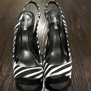 Zebra slingback pumps